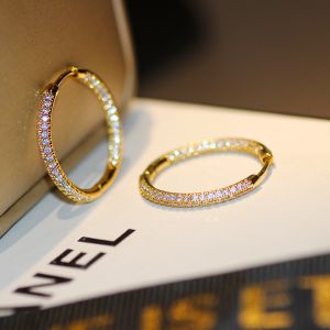Hoop Earrings with Sparkling Stones in Gold