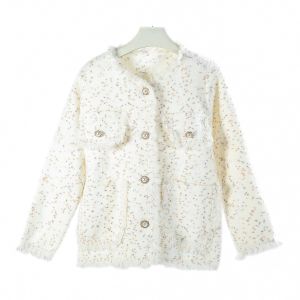 SK096 Cardigan with brown spots in Cream
