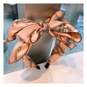 HA833 Oversize bow with chains headband in Peach