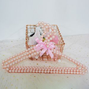 SKI013 Blush pearls coat hanger with silky bow