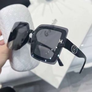 7706 diamante oval Letter H sunglasses in Black