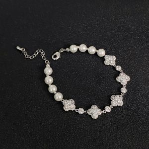 EUR437 Pearls and crystals bracelet in Ivory