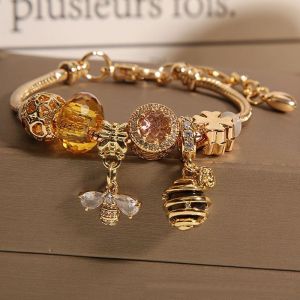EUR388 Crystals jewelled bee bangle in Rose Gold