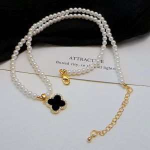 EUR41four petal drop Pearl necklace in Ivory