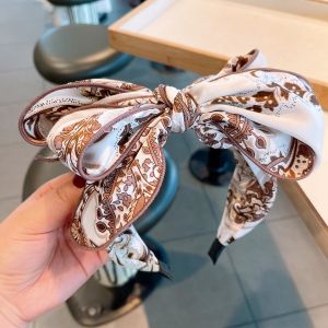 HA807 Oversize bow headband in Beige/Brown floral print