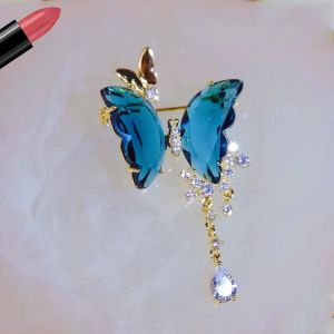 1549 Crystals glass look butterfly brooch in Aqua Blue