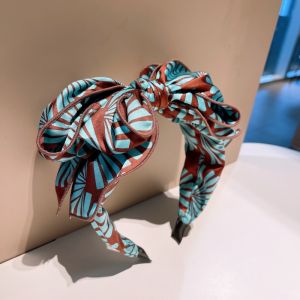 HA800 Oversize bow headband with tropical leaves print in Blue