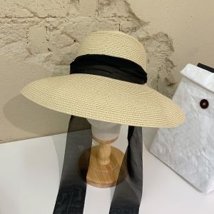 WH171 large brim straw hat with Ribbon tie fastener in Ivory