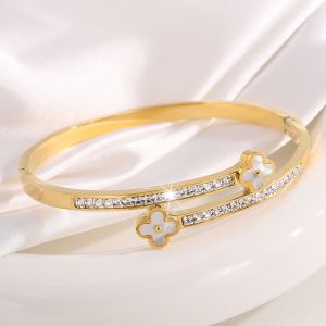Gold Four Petals Flower Bangle in Cream EUR497