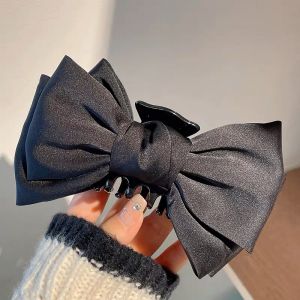 SS54 Double satin bow hair claw in Black