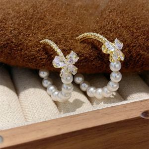 EUR418 Crystals butterfly and pearls earring in Ivory