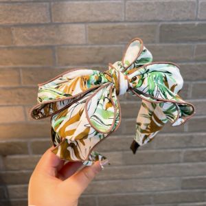 HA803 Oversize bow headband with tropical leaves print in Green
