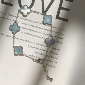 EUR420 Four petals flower bracelet in pastel Blue Silver plating