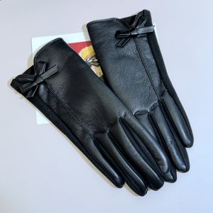 Elegant Faux Leather Gloves with Bow Detail in Black LG008