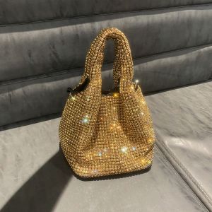 AW20 grab handle crystal bag in Gold