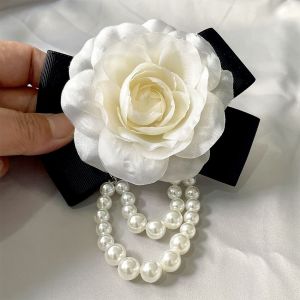 1551Camellia flower brooch with pearl detail in Cream/Black